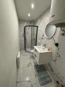 Koupelna v ubytování KK Apartament Marszałkowski