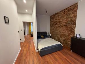 Postel nebo postele na pokoji v ubytování KK Apartament Marszałkowski