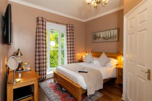 Postel nebo postele na pokoji v ubytování Coalbrookdale Villa + 37 fotografií