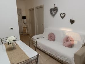 Postel nebo postele na pokoji v ubytování Le Sirene Sweet Home