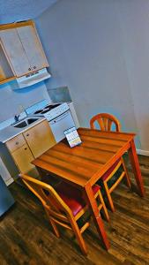 Kuchyň nebo kuchyňský kout v ubytování Wayfarer Motel