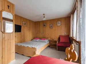 Łóżko lub łóżka w pokoju w obiekcie Dom Lesnik