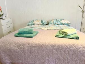A bed or beds in a room at Apartments Ares