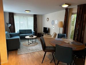Posezení v ubytování Chalet in Drenthe