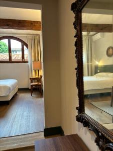 A bed or beds in a room at Affittacamere Zanobi 45