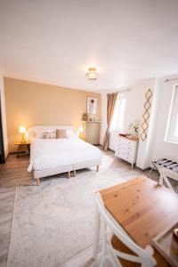 Postel nebo postele na pokoji v ubytování Villa Vichéia - Appartement 33