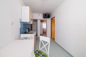 Kuchyň nebo kuchyňský kout v ubytování Apartments Ivan