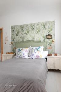 Ένα ή περισσότερα κρεβάτια σε δωμάτιο στο Beatrice Cottage