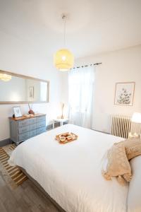 Posteľ alebo postele v izbe v ubytovaní Villa Vichéia - Appartement 11