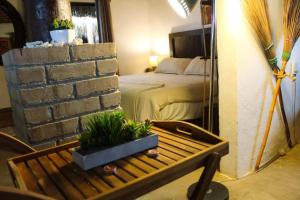 RUSTICO LOUNGE-Property in front of the beach客房内的一张或多张床位