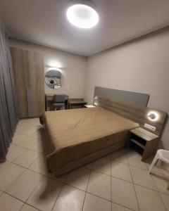 A bed or beds in a room at House Spanos