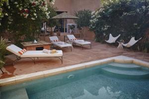 Πισίνα στο ή κοντά στο Riad Caravane