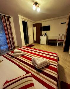 Postel nebo postele na pokoji v ubytování Casa Kmy