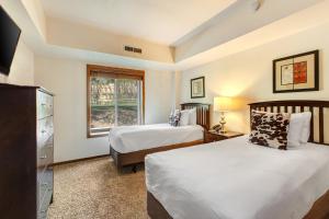 Ένα ή περισσότερα κρεβάτια σε δωμάτιο στο PARK STATION 214-1 condo