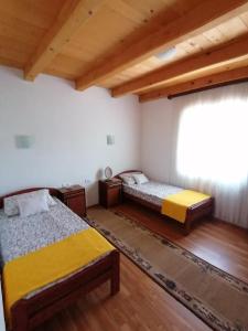 A bed or beds in a room at Country house Todor