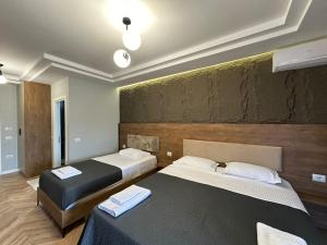 Postel nebo postele na pokoji v ubytování Your Apart Hotel