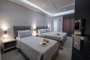 Cama ou camas em um quarto em Hotel Porti mais 190 fotos