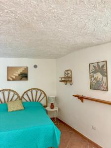 En eller flere senge i et værelse på Il Grottino By Gargà Residency + 29 billeder