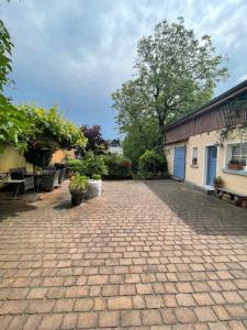 Taman di luar OF Rent - Zimmer mit Bad in Offenbach 12km bis Frankfurt Zentrum +7 gambar