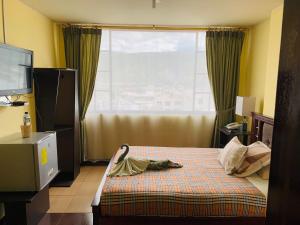 Letto o letti in una camera di Dos Hemisferios