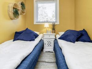 Postel nebo postele na pokoji v ubytování Holiday home Storvorde XVIII