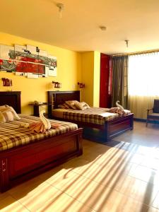 Letto o letti in una camera di Dos Hemisferios