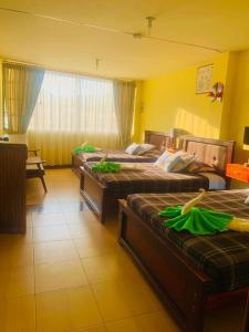 Letto o letti in una camera di Dos Hemisferios