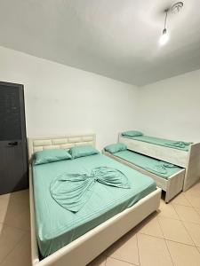 Ένα ή περισσότερα κρεβάτια σε δωμάτιο στο Hotel 24