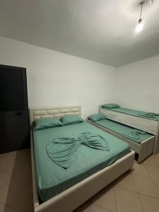 Ένα ή περισσότερα κρεβάτια σε δωμάτιο στο Hotel 24