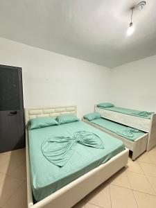 Ένα ή περισσότερα κρεβάτια σε δωμάτιο στο Hotel 24