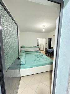 Ένα ή περισσότερα κρεβάτια σε δωμάτιο στο Hotel 24