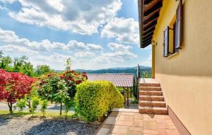 a stairway leading to a house with a view of a garden at Secluded holiday house Glavnica Donja, Zagreb - 23154 in Belovar