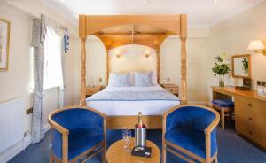 Säng eller sängar i ett rum på Moorhill House Bed & Breakfast