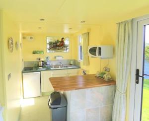 Köök või kööginurk majutusasutuses Pheasant Suites