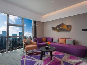 Area soggiorno di Hampton by Hilton Guangzhou Wenchong