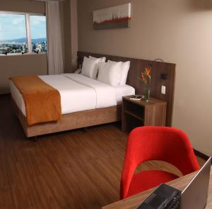Cama ou camas em um quarto em BH Raja Hotel