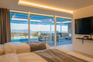 TV a/nebo společenská místnost v ubytování Haeilri Pool&SPA Hotel