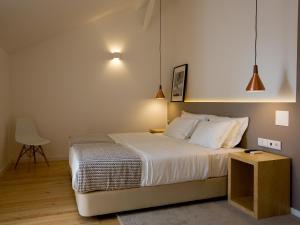 더 8 - 다운타운 스위트 객실 침대