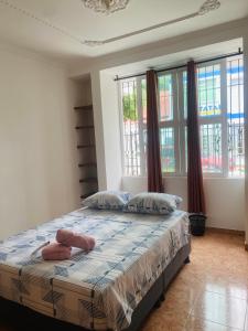 Postel nebo postele na pokoji v ubytování Cartagena Kings Hostel