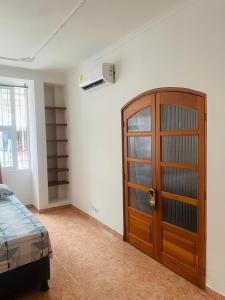 Postel nebo postele na pokoji v ubytování Cartagena Kings Hostel