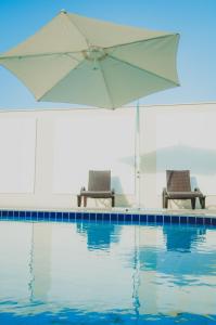 The swimming pool at or close to Nobile Suites Gran Lumni