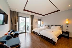 Postel nebo postele na pokoji v ubytování Eco Lux Riverside Hotel & Spa