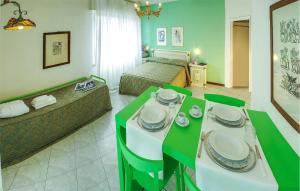 A bed or beds in a room at Gorgeous Apartment In Cattolica
