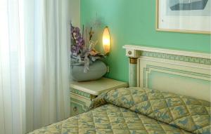 A bed or beds in a room at Gorgeous Apartment In Cattolica