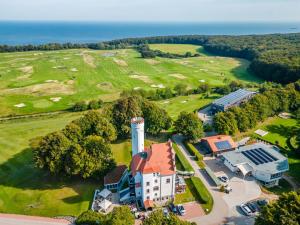 an aerial view of a building with a water tower at Villa Homeport Rügen in Lohme