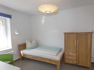 Ένα ή περισσότερα κρεβάτια σε δωμάτιο στο Haus Residence Comfortable holiday residence