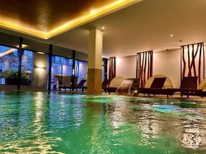 Swimmingpoolen hos eller tæt på Beach holiday Comfortable holiday residence