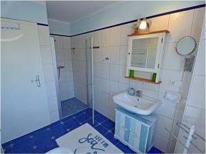 Ένα μπάνιο στο Sea Cucumber Comfortable Holiday Residence