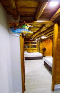 Postel nebo postele na pokoji v ubytování Cabañas Barikoke-Bora Bora