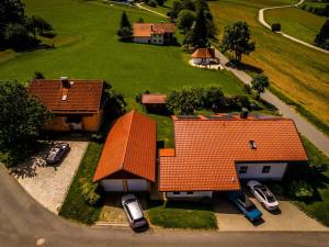 an aerial view of a house with cars parked in the yard at Anna Geißinger Comfortable holiday residence in Mauth